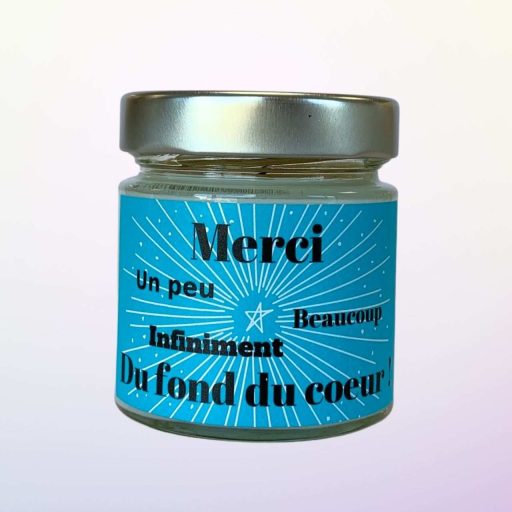 bougie a message de remerciement dans un pot en verre transparent